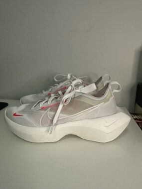 Nike Women’s White Mesh Sneakers with Coral Accents